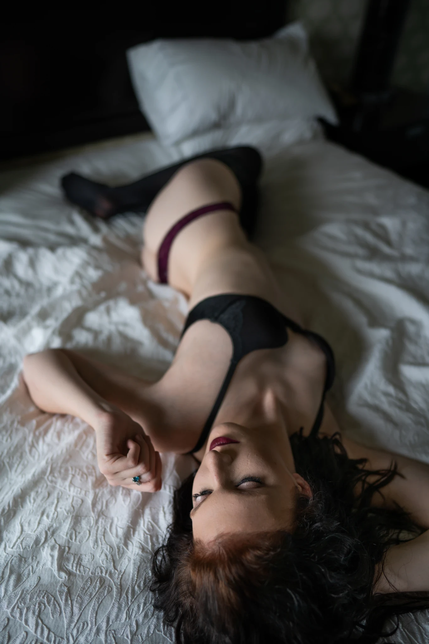 Boudoir portrait with cinematic lighting